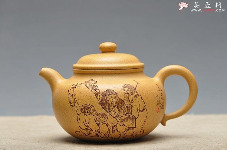 紫砂壶图片：古朴经典 儒雅得体 通景山水 莲子 - 美壶网