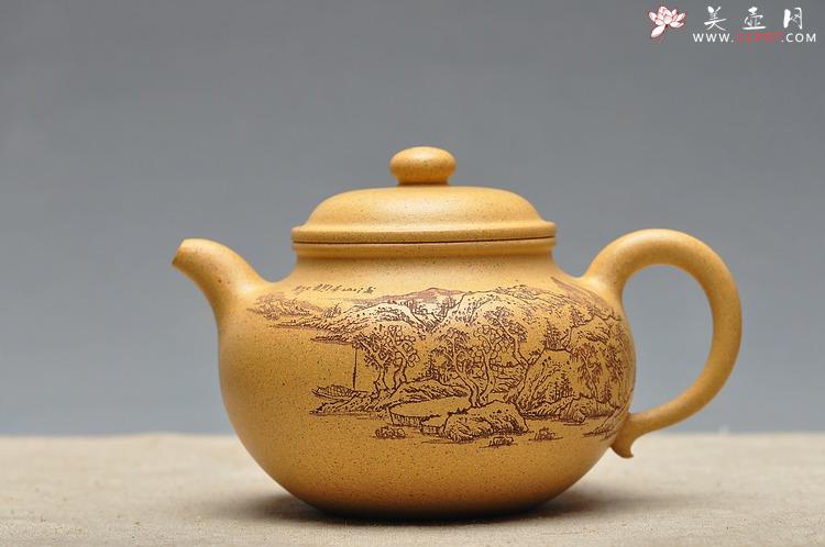 紫砂壶图片：古朴经典 儒雅得体 通景山水 莲子 - 美壶网