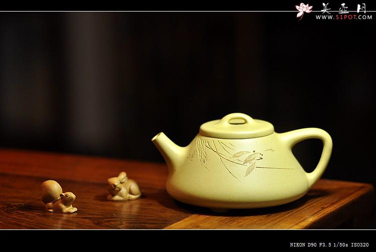 紫砂壶图片：素雅文气 骨格清奇 本山绿之兰花子冶石瓢 - 美壶网