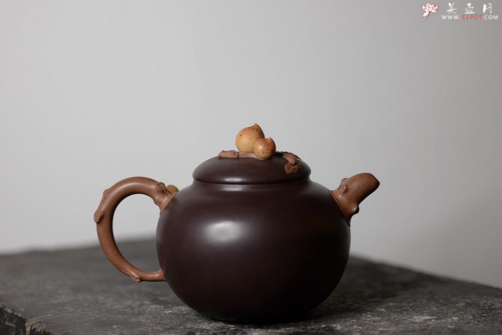 紫砂壶图片：原创作品 孙伟强张新亚合作 寿桃 饱满大气 贴叶精湛 - 美壶网