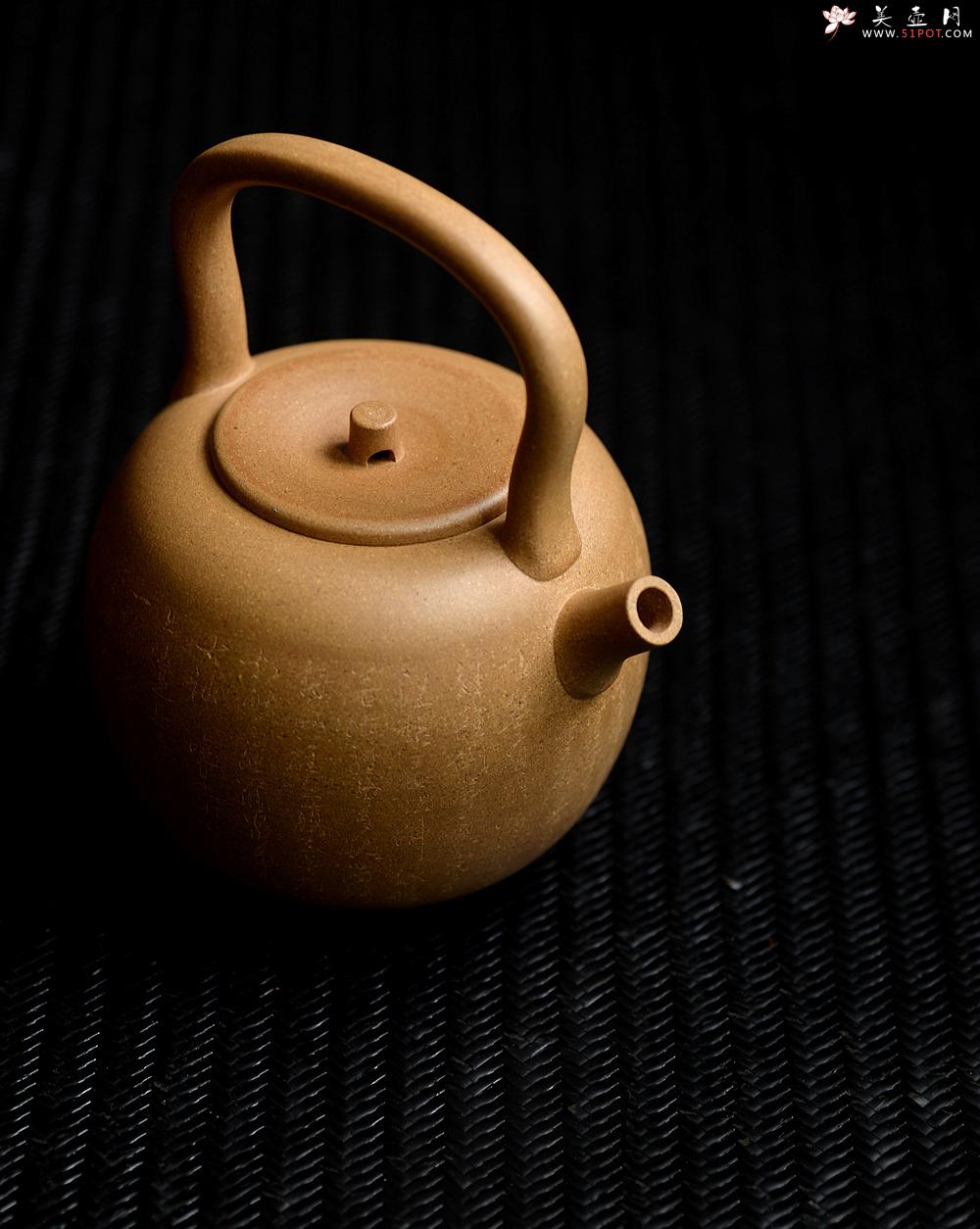 紫砂壶图片：淞庐原创作品 饱满挺拔 雅致文气 全手心经提梁 可以烧水的巨轮 - 美壶网