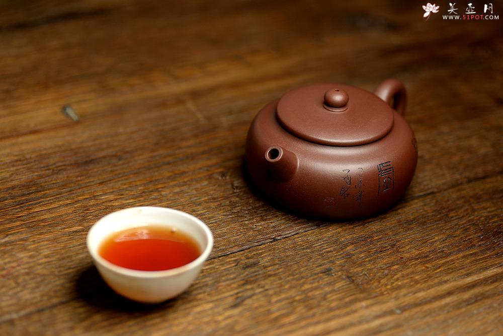 紫砂壶图片：实用佳器 秀气可爱 扁拙 - 美壶网
