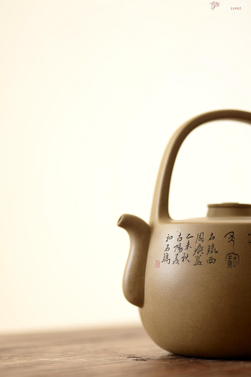 紫砂壶图片：钱琴芳全手作品 国师和石装饰  大石鼓提梁 文气十足 - 美壶网