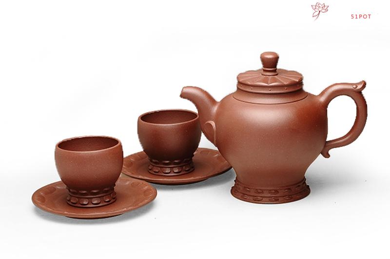 紫砂壶图片：如意宝瓶套壶（此壶由许亚均与张家八世活佛合作制作 专利号：201330654693 - 美壶网