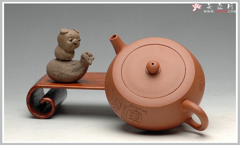 紫砂壶图片：简练古拙 杀茶利器  全手折肩巨轮 - 美壶网