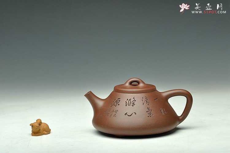 紫砂壶图片：骨肉均挺 进步明显 全手子冶石瓢 张听刚装饰 - 美壶网