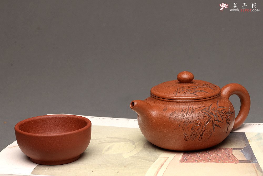 紫砂壶图片：传统经典 优质降坡泥~~小仿古 刻绘精致 仅此一把 - 美壶网