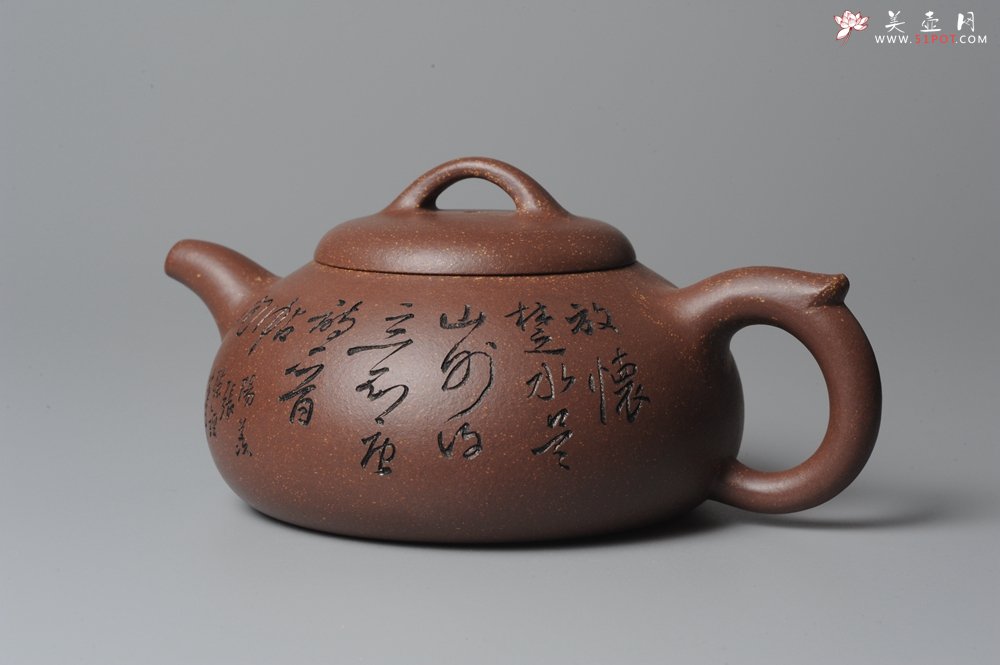 紫砂壶图片：文气装饰 饱满敦厚 扁腹 - 美壶网
