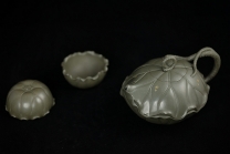 紫砂壶图片：紫砂臻品 荷叶微卷有清香之和合套壶 孙伟强张新亚合作 至美清廉 - 美壶网