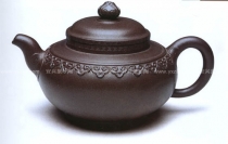 紫砂壶图片：云肩如意壶 - 美壶网