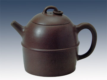 裴石民紫砂壶 穿顶云足 