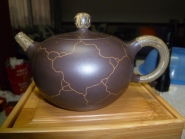 紫砂壶图片：卧虎戏珠 - 美壶网