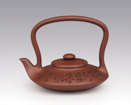孙越芳紫砂壶 曲意提梁 