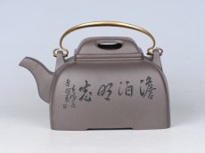 紫砂壶图片：牛盖提梁 - 美壶网