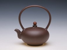 紫砂壶图片：鸿运提梁 泥料：拼紫 - 美壶网