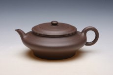 紫砂壶图片：虚扁 - 美壶网