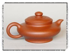 紫砂壶图片：虚扁 - 美壶网