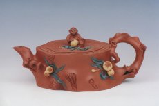 紫砂壶图片：金猴尝仙（清水泥） - 美壶网