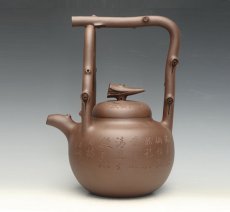 紫砂壶图片：东坡提梁 2012年手工制陶大赛三等奖 - 美壶网