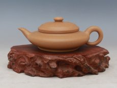 紫砂壶图片：虚扁 - 美壶网
