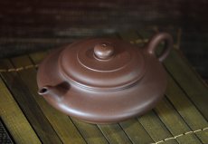 紫砂壶图片：虚扁 - 美壶网