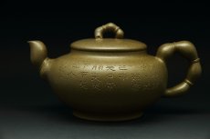 紫砂壶图片：佛度壶（石陶刻） - 美壶网