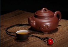 紫砂壶图片：三足如意 - 美壶网