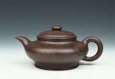 紫砂壶图片：虚扁 - 美壶网