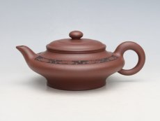 紫砂壶图片：虚扁 - 美壶网