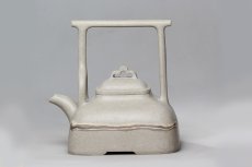 紫砂壶图片：弧菱提梁 - 美壶网