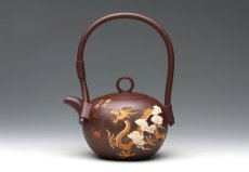 紫砂壶图片：龙凤呈祥提梁 - 美壶网