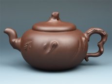紫砂壶图片：把根留住 - 美壶网
