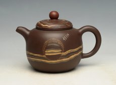 紫砂壶图片：旭日东升 - 美壶网