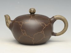 紫砂壶图片：卧虎戏珠 - 美壶网