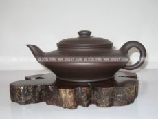 紫砂壶图片：虚扁 - 美壶网