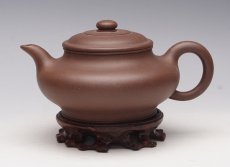 紫砂壶图片：虚扁 - 美壶网