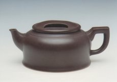紫砂壶图片：黑牛 - 美壶网
