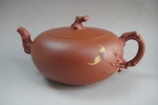 紫砂壶图片：桃花太阳 - 美壶网